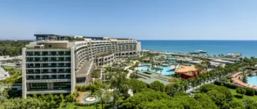 Regnum The Crown | General view of the hotel pools and the beach